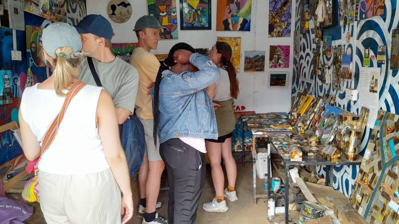Guests browsing carved and beaded handmade items at the craft centre